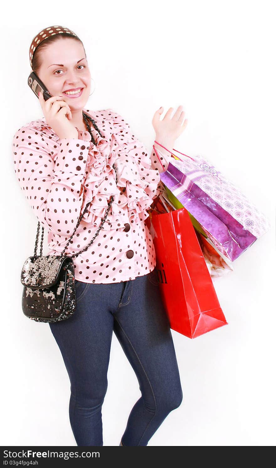 Woman with purchases on a white background