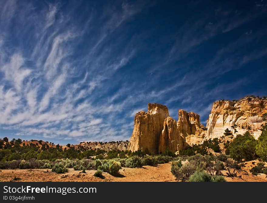 Desert landscape with blazing sky.