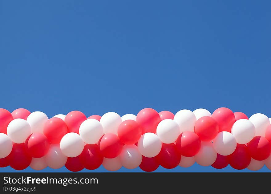 Sheaf Of Balloons Against The Sky