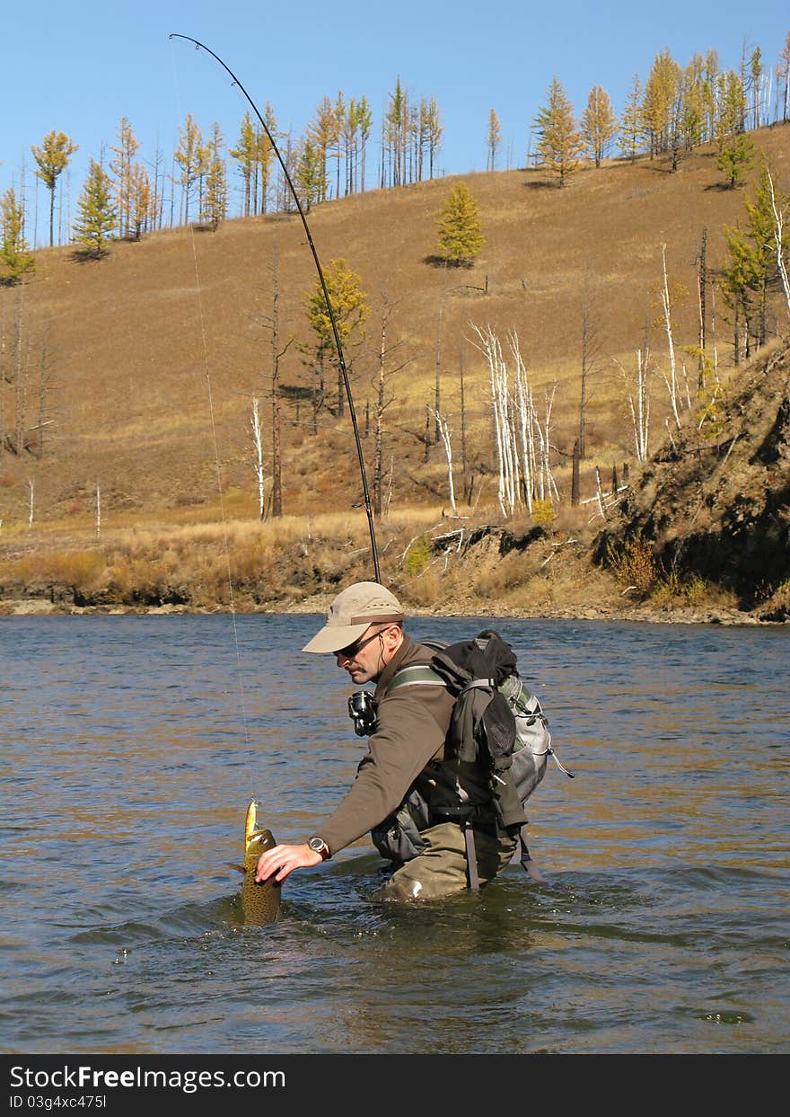 Fishing - fisherman catched big trout