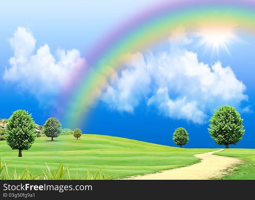 Rainbow in the blue sky over a glade. Rainbow in the blue sky over a glade