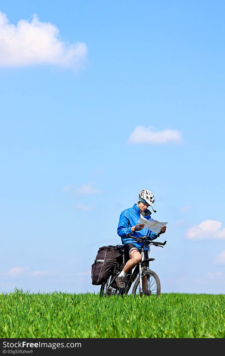 Mountain Biker On Sunny Day