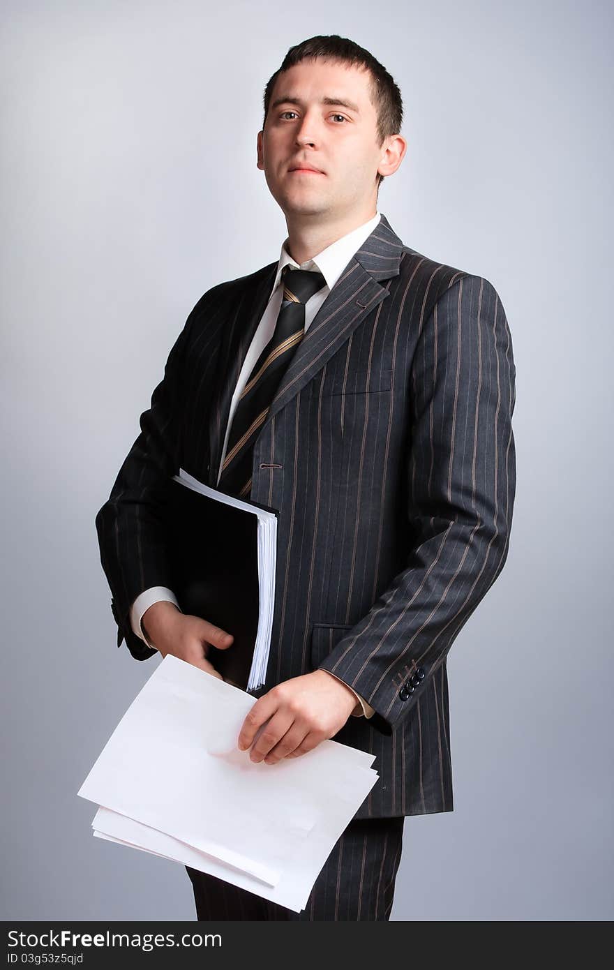 Businessman portrait in a jacket and tie