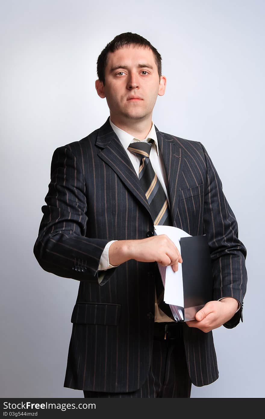 Businessman portrait in a jacket and tie