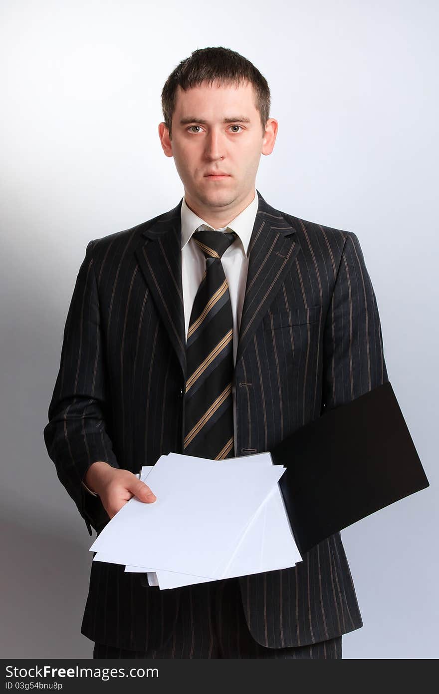 Businessman portrait in a jacket and tie