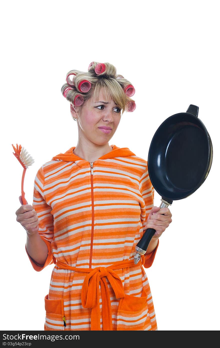 Housewife with a brush and pan