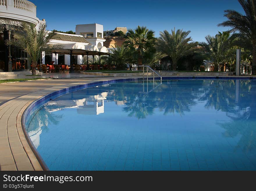 The pool in the tropical hotel