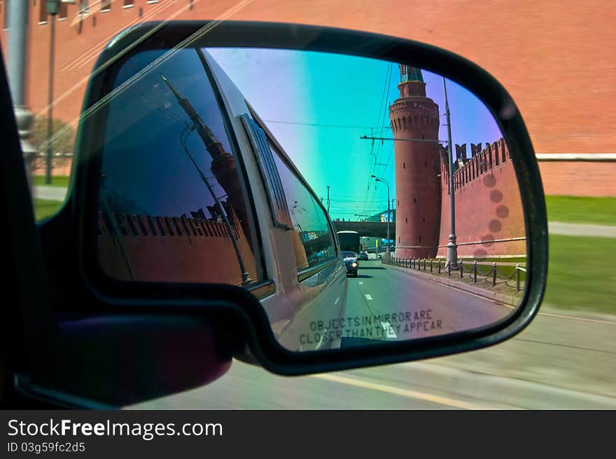 City view reflection in auto mirror