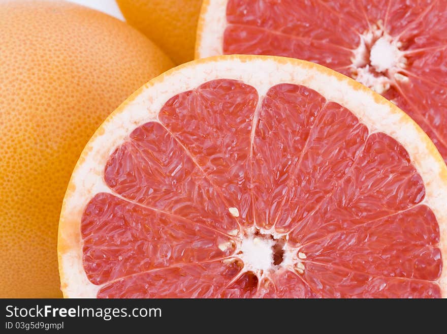 Red grapefruits background