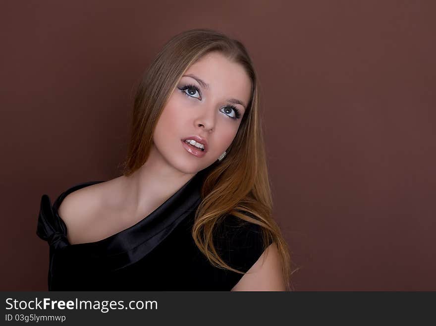 Portrait of a beautiful young sexy woman with long  hair, studio shot. Portrait of a beautiful young sexy woman with long  hair, studio shot