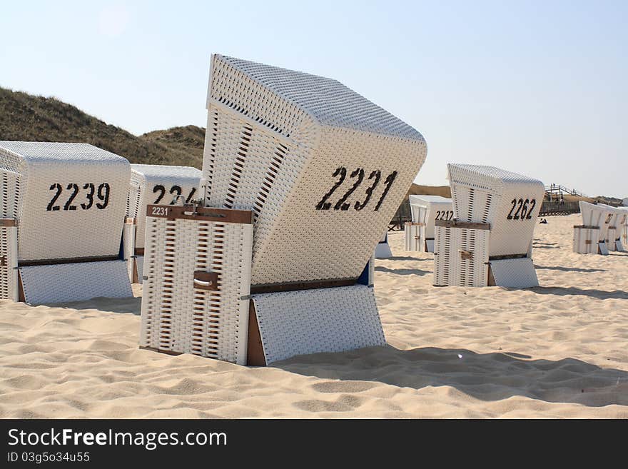 Beach chairs on a sandy beach