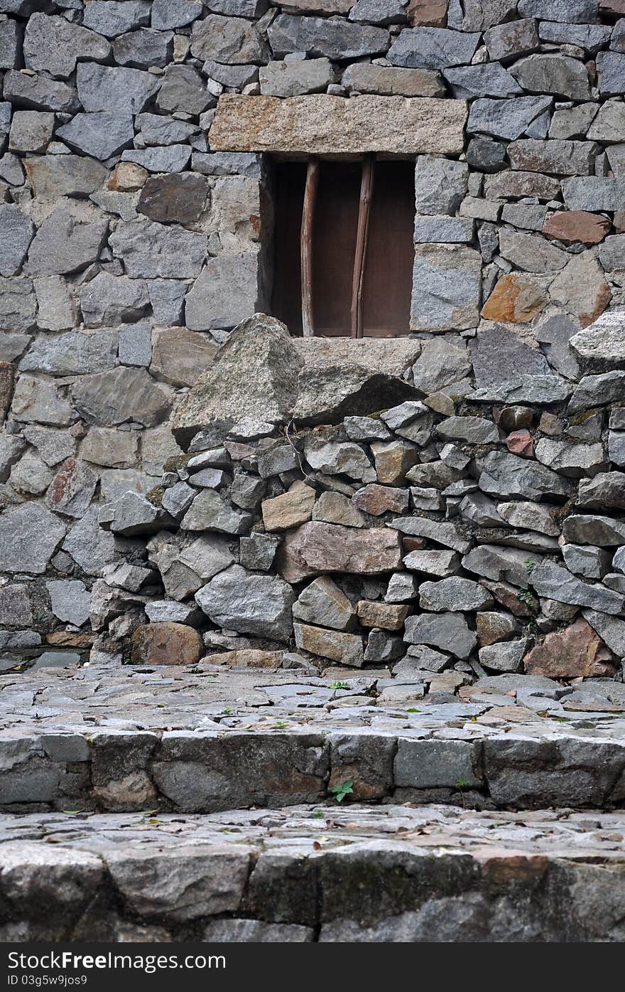 Small Window On Stone Wall