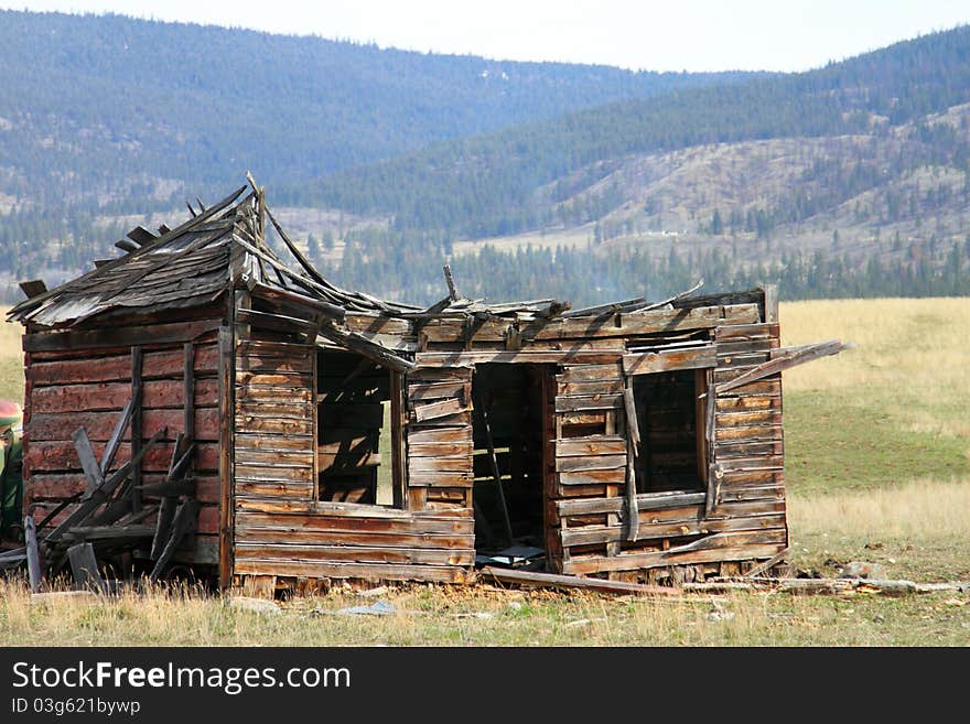 Broken down wooden building in rural area. Broken down wooden building in rural area