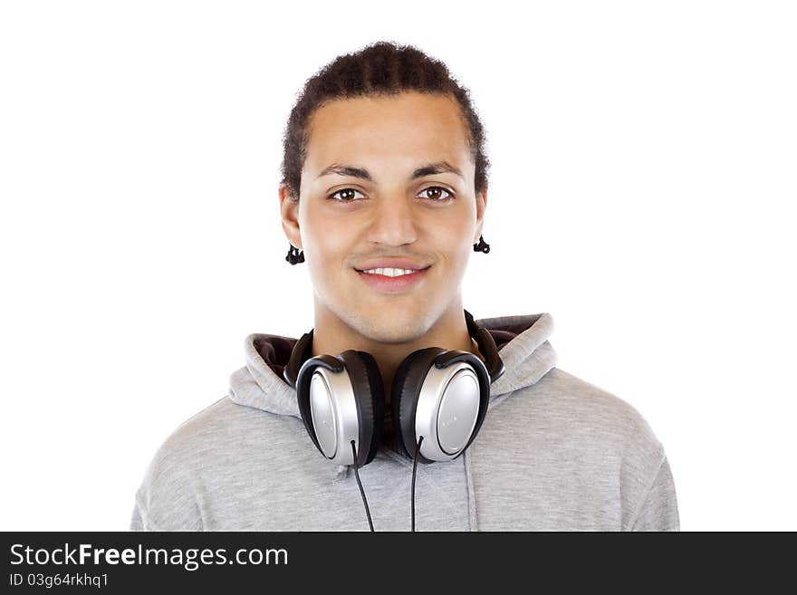 Portrait of a smiling dark-skinned young man with headphones.Isolated on white background. Portrait of a smiling dark-skinned young man with headphones.Isolated on white background.