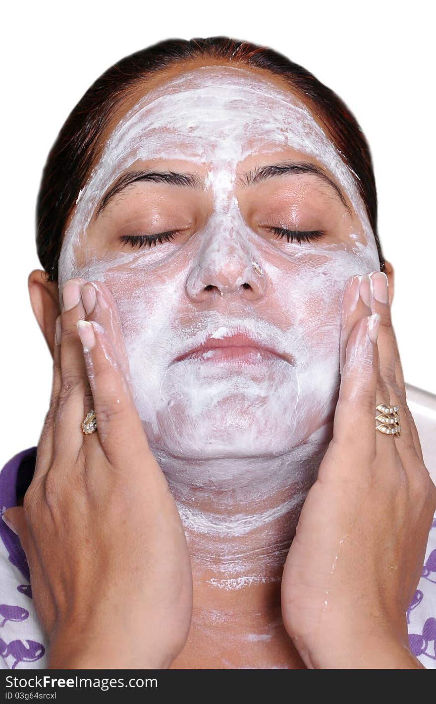 Women doing massage on her face