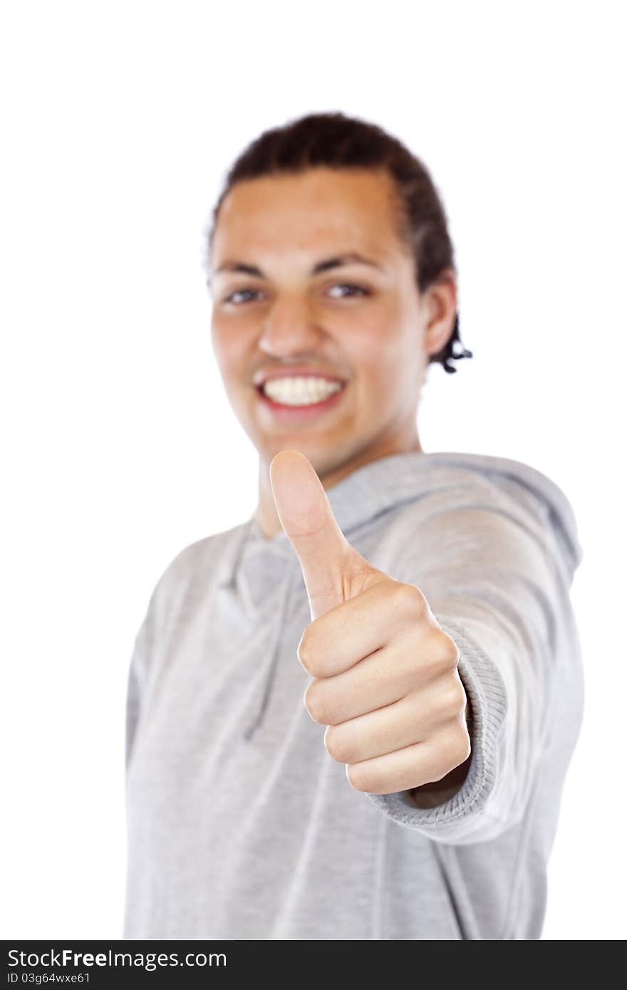 Cheerful black coloured African holds thumb up.Isolated on white background.