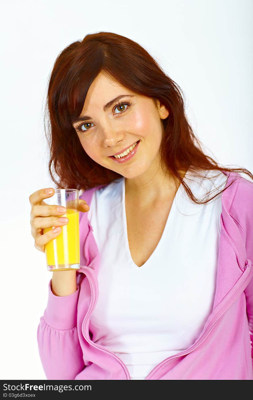 Portrait of beautiful young lady with glass of orange juice. Portrait of beautiful young lady with glass of orange juice