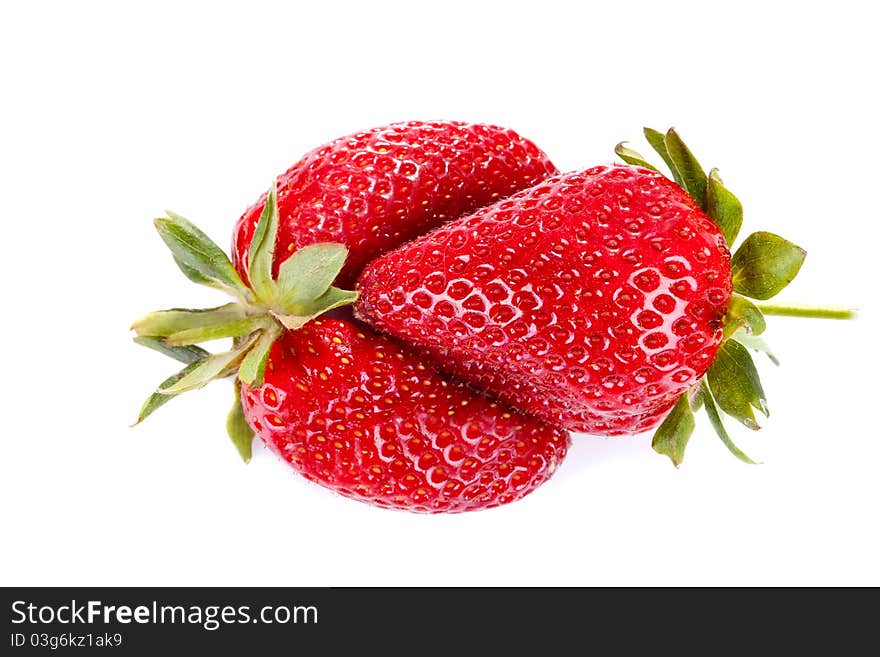 Closeup of strawberries isolated over white background