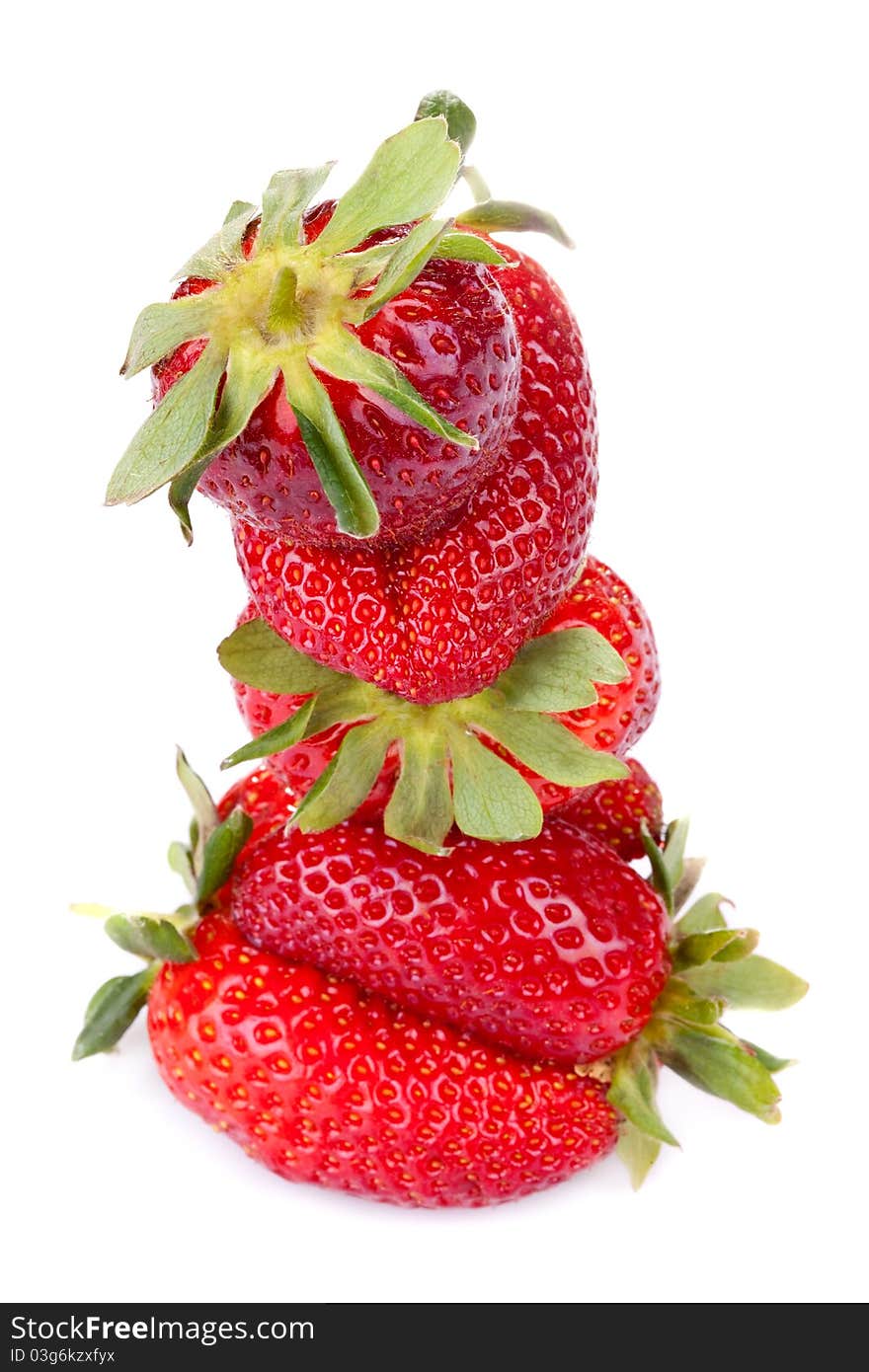 Closeup picture of beautiful strawberries isolated on white