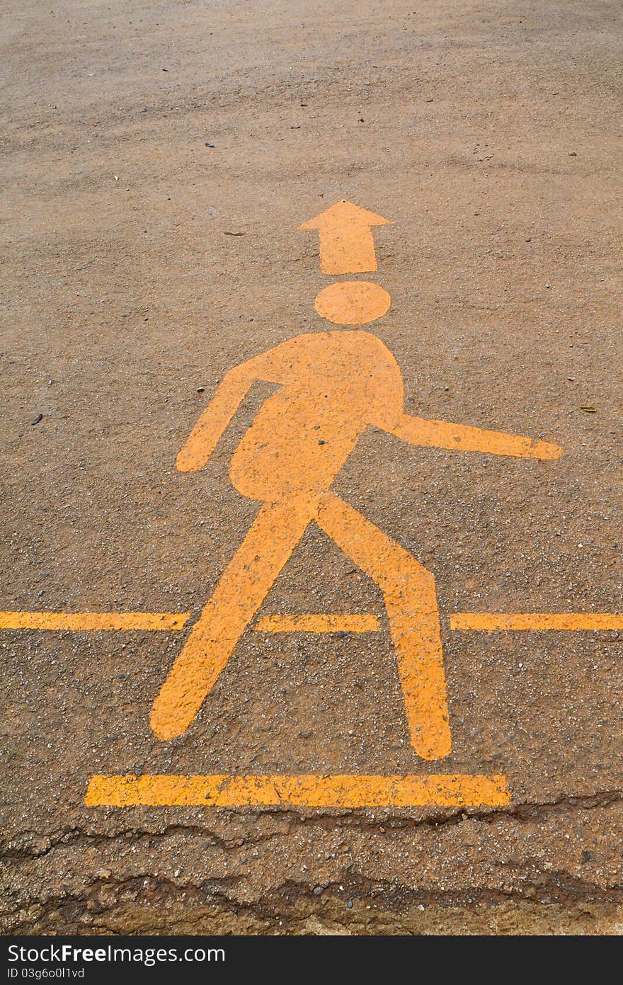 Signs for walking painted on the asphalt. Signs for walking painted on the asphalt.