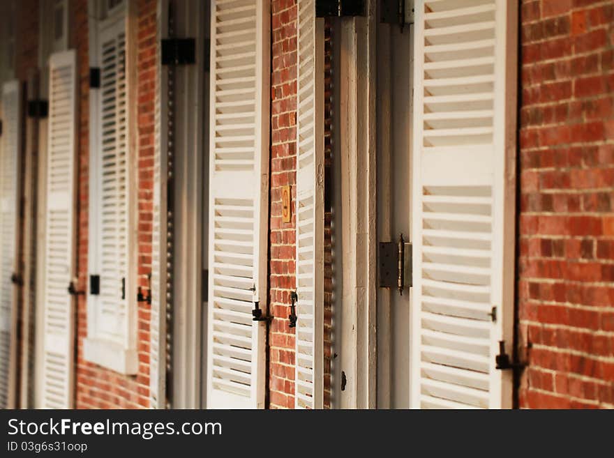 The red brick and white window