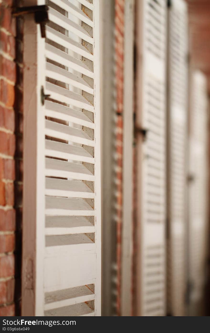 The red brick and white window