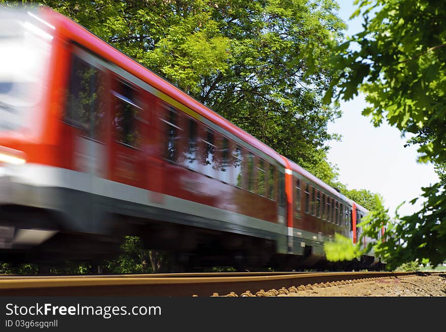 Passing passenger train from the frog perspective. Passing passenger train from the frog perspective