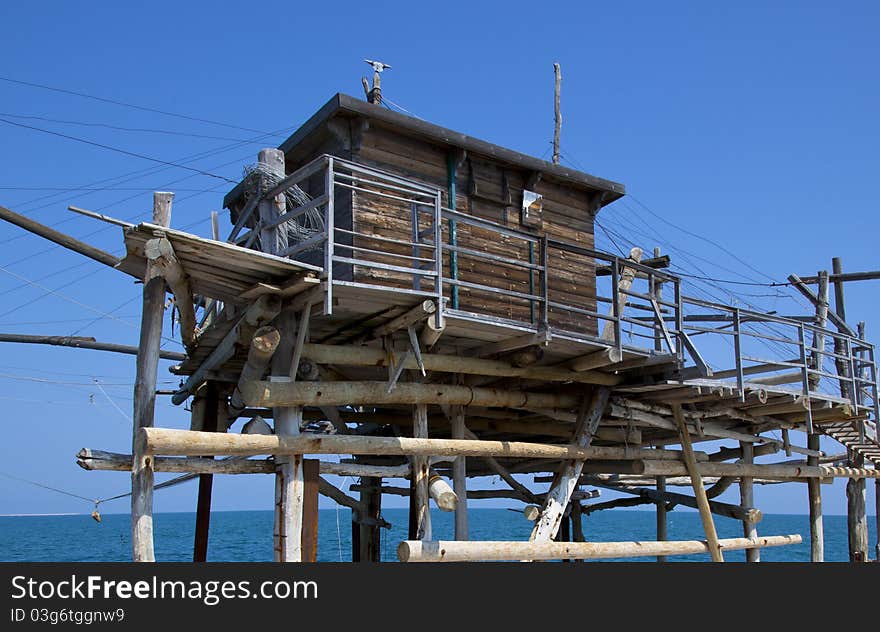 A trabucco in Italy with blue sky