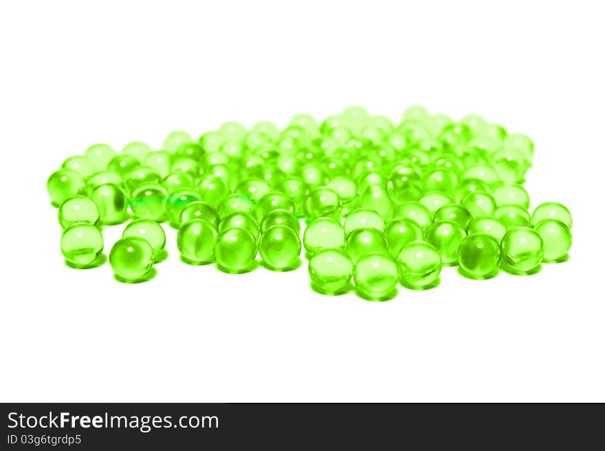 Photo of the Green capsules on white background