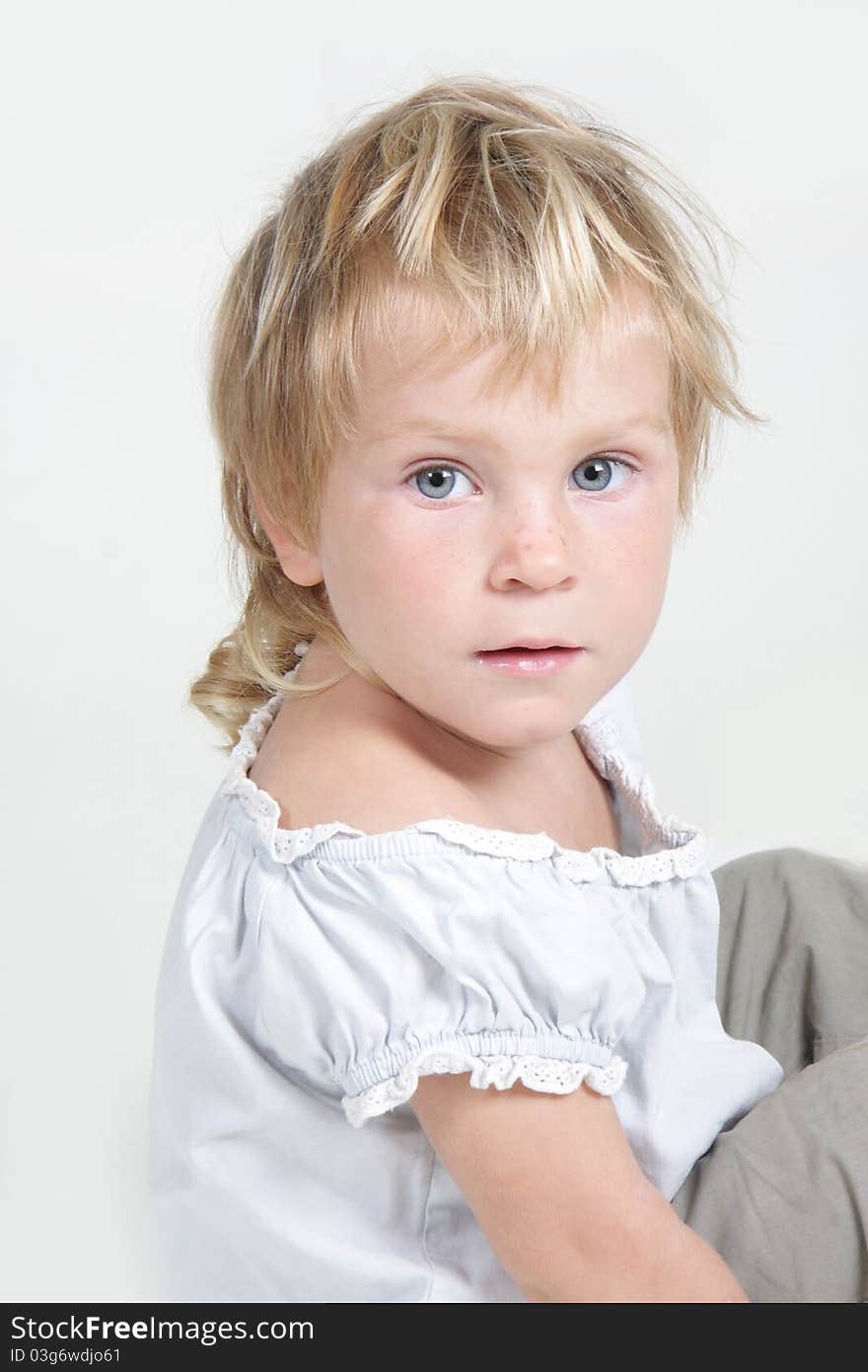 Cute toddler girl over white