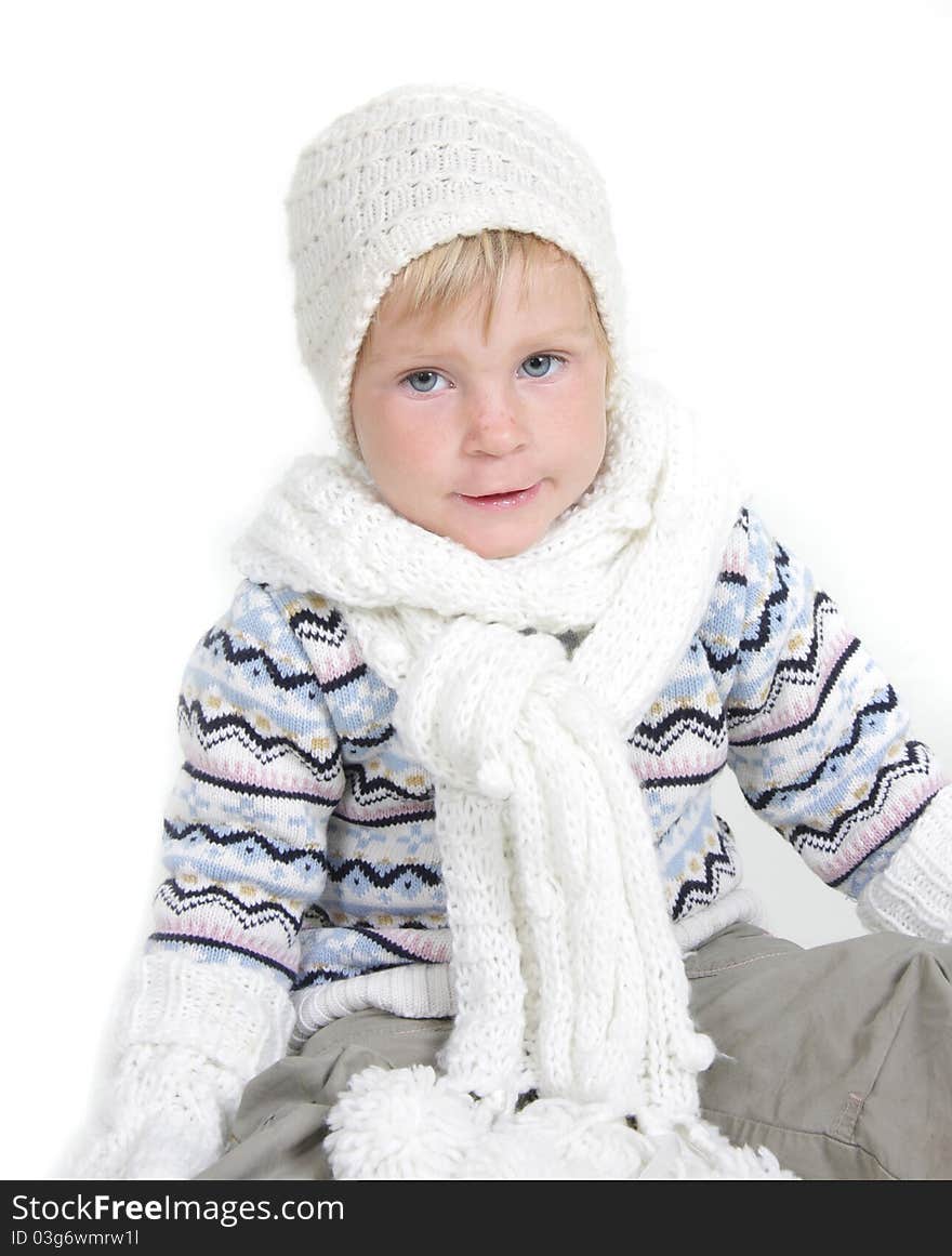 Cute toddler girl in winter clothes