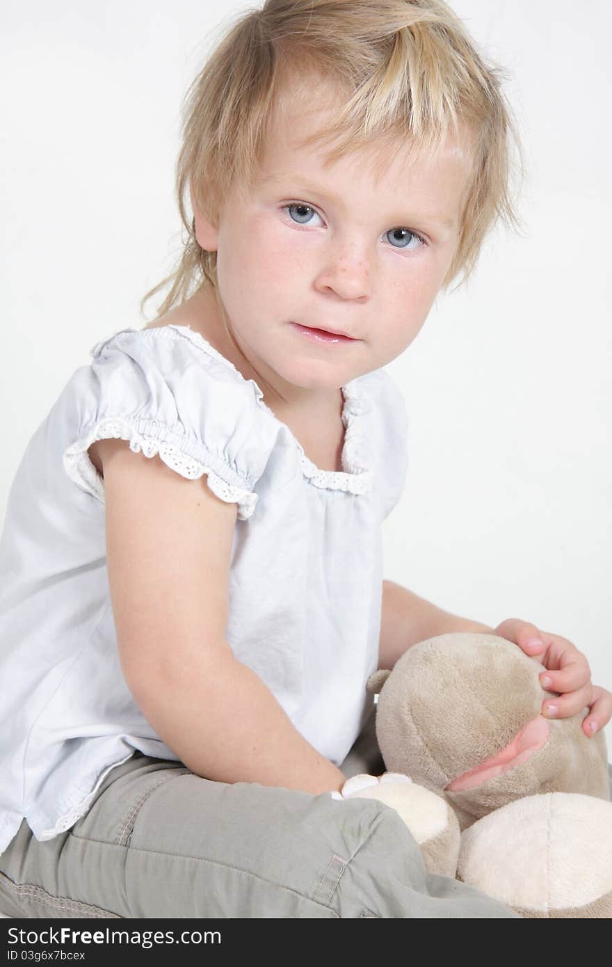 Child with no-name toy hippo