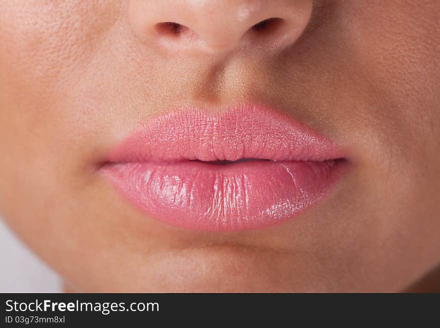 woman lips with pink make up. woman lips with pink make up.