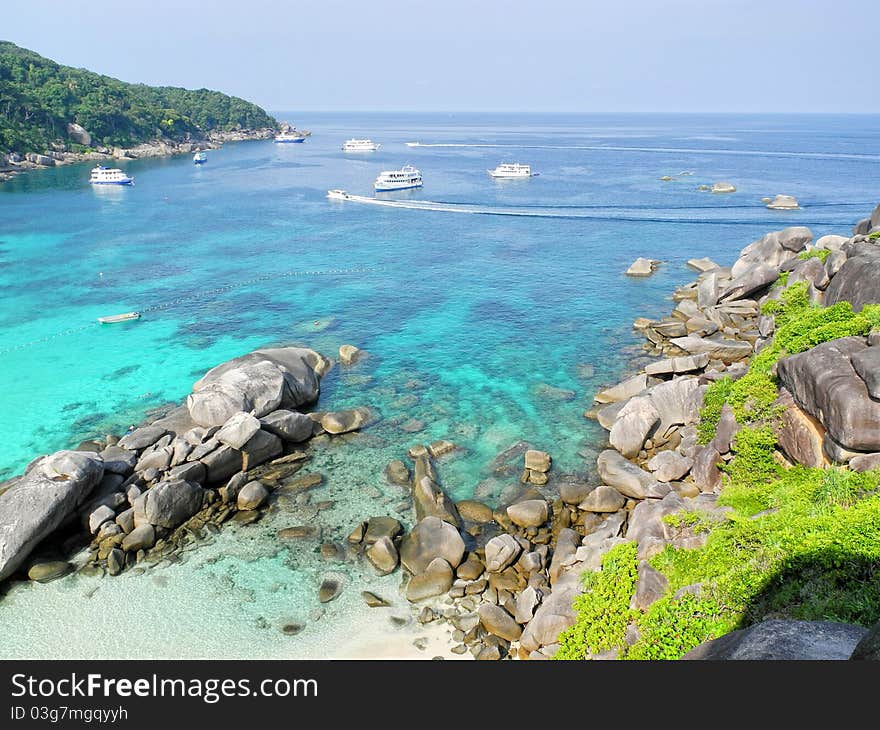 Beach and seascape with ships and speed boat in thailand similan island. Beach and seascape with ships and speed boat in thailand similan island