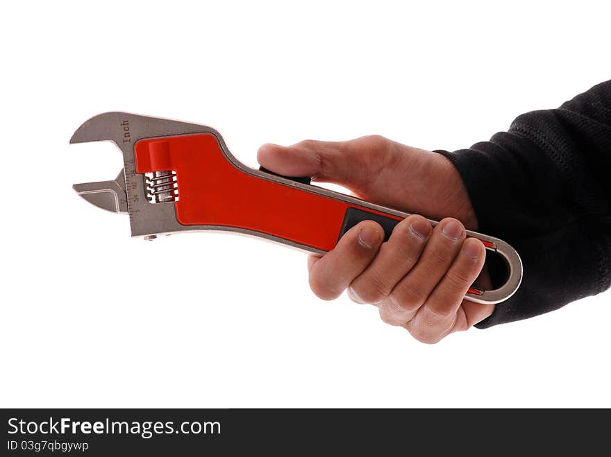 Hand Holding A Wrench