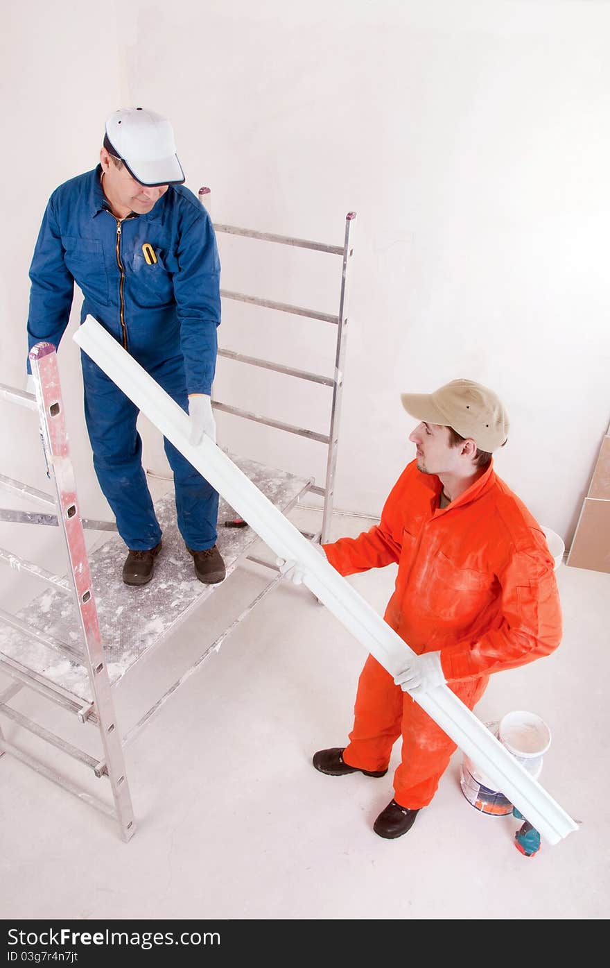 Two Construction workers at work