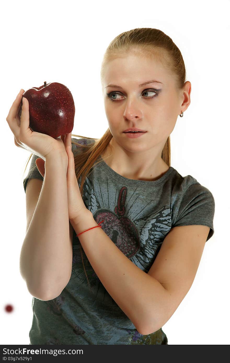 The blonde with an apple on a white background