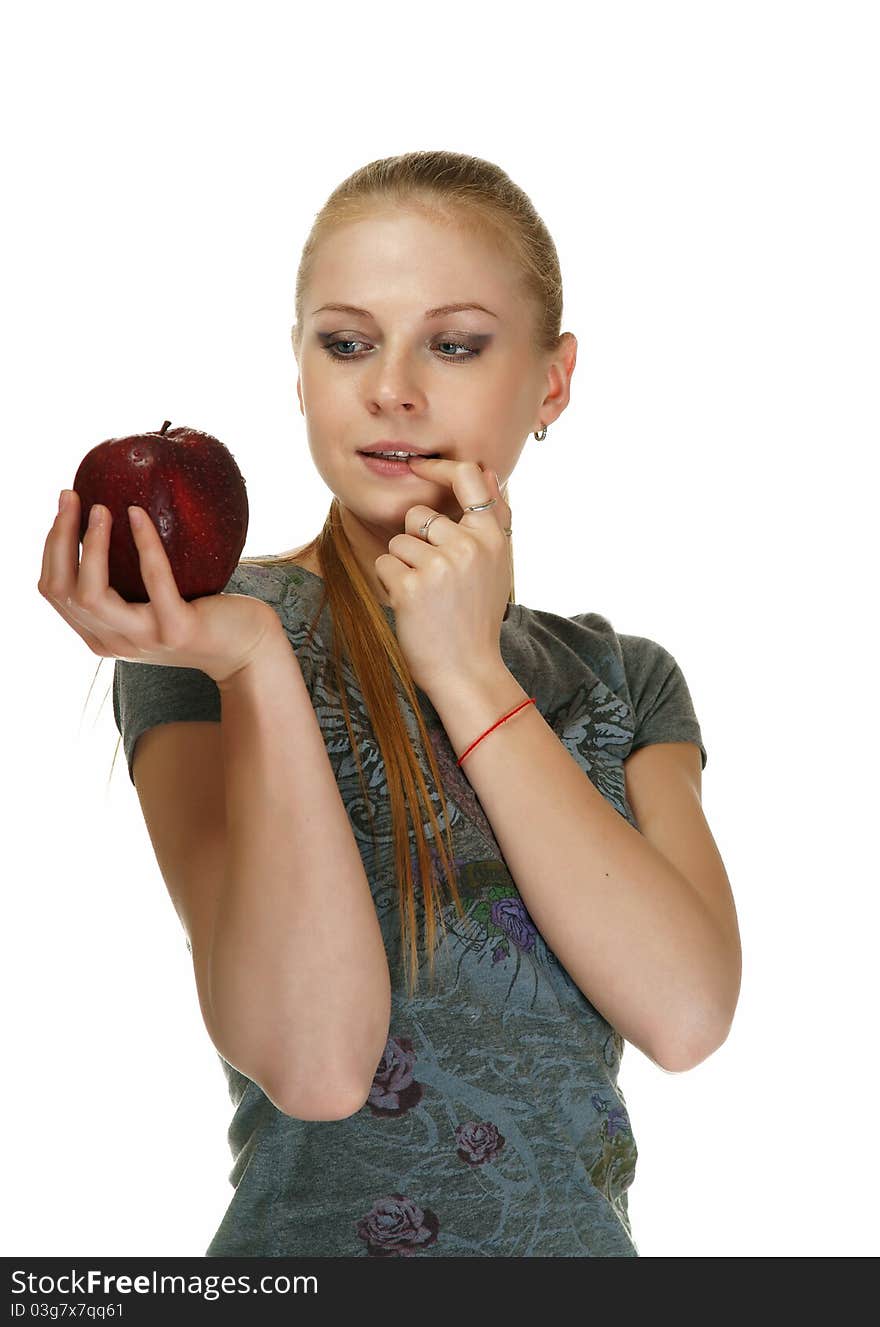 The blonde with an apple on a white background