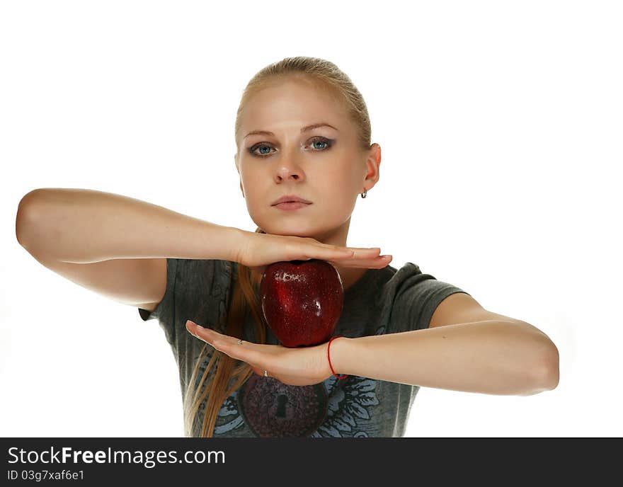 The blonde with an apple on a white background