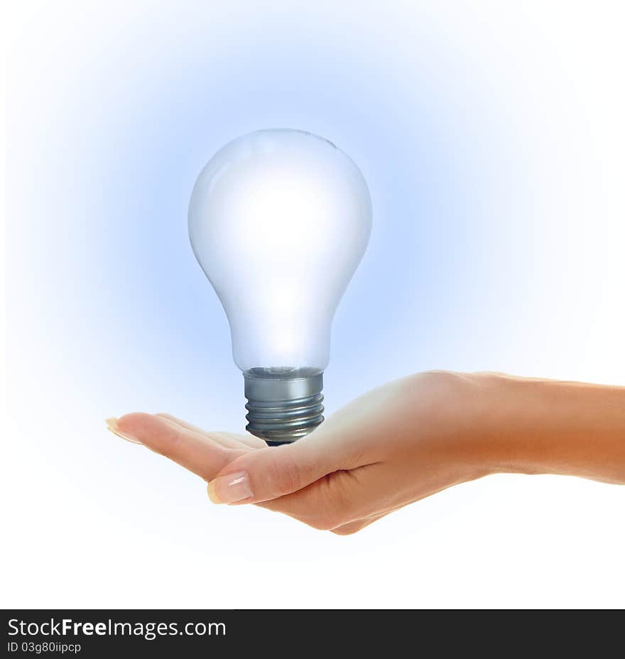 Woman's hands holding shiny lamp. Woman's hands holding shiny lamp