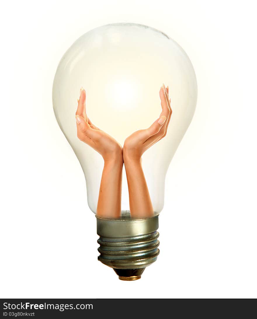 Woman's hands holding shiny lamp. Woman's hands holding shiny lamp