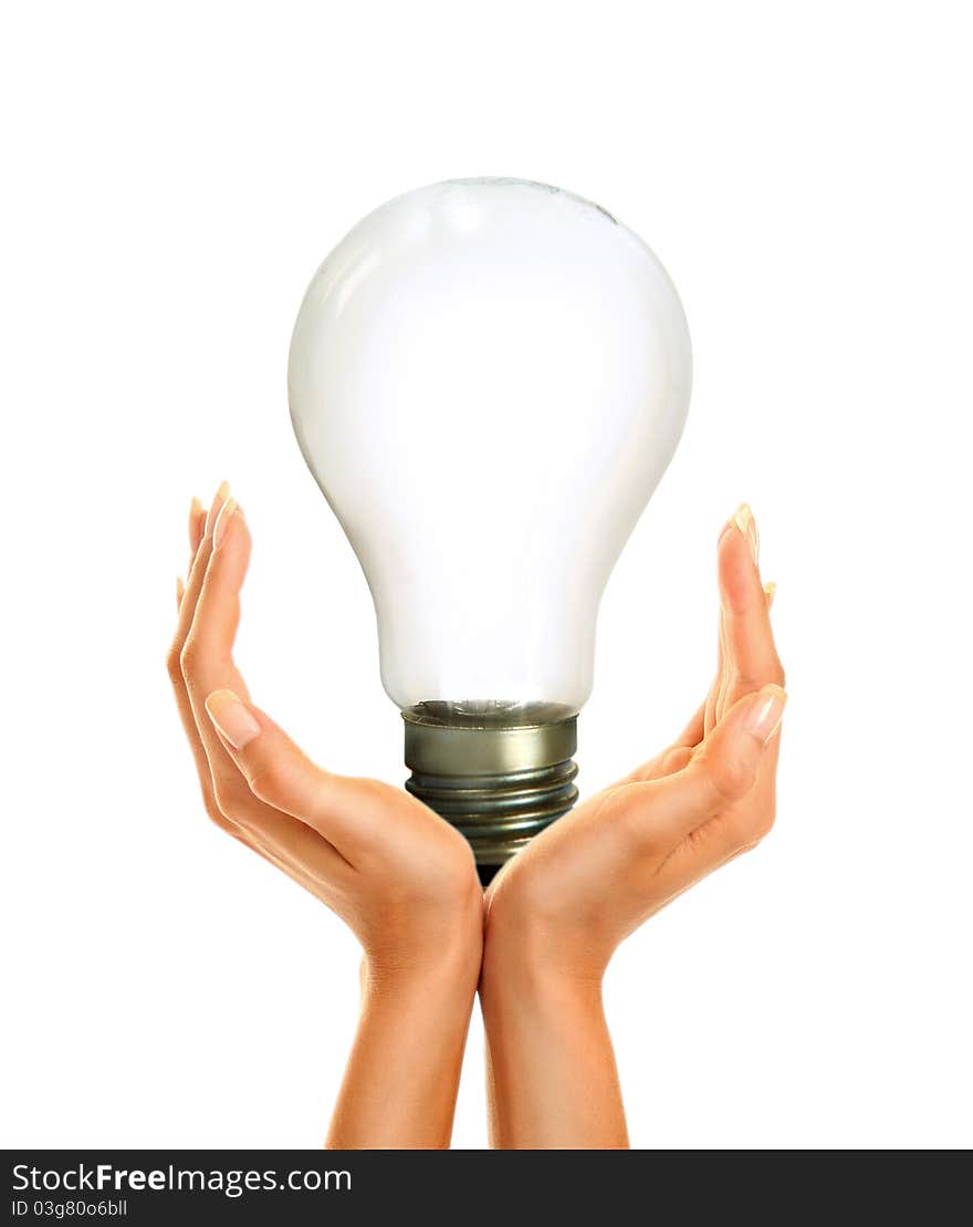 Woman's hands holding shiny lamp. Woman's hands holding shiny lamp