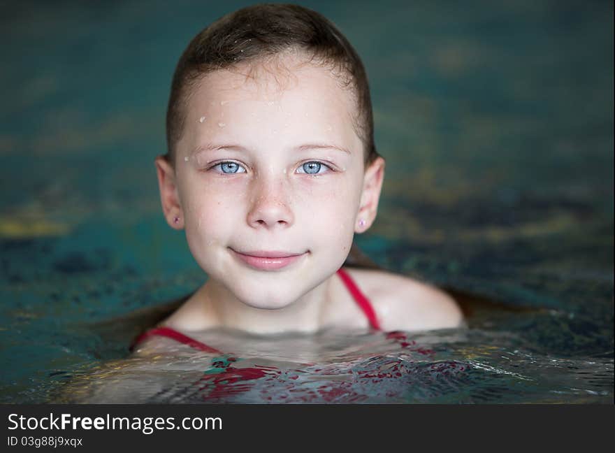 Little girl in swimming pool