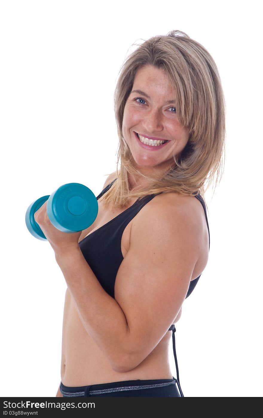 Active Woman doing exercises with dumbels