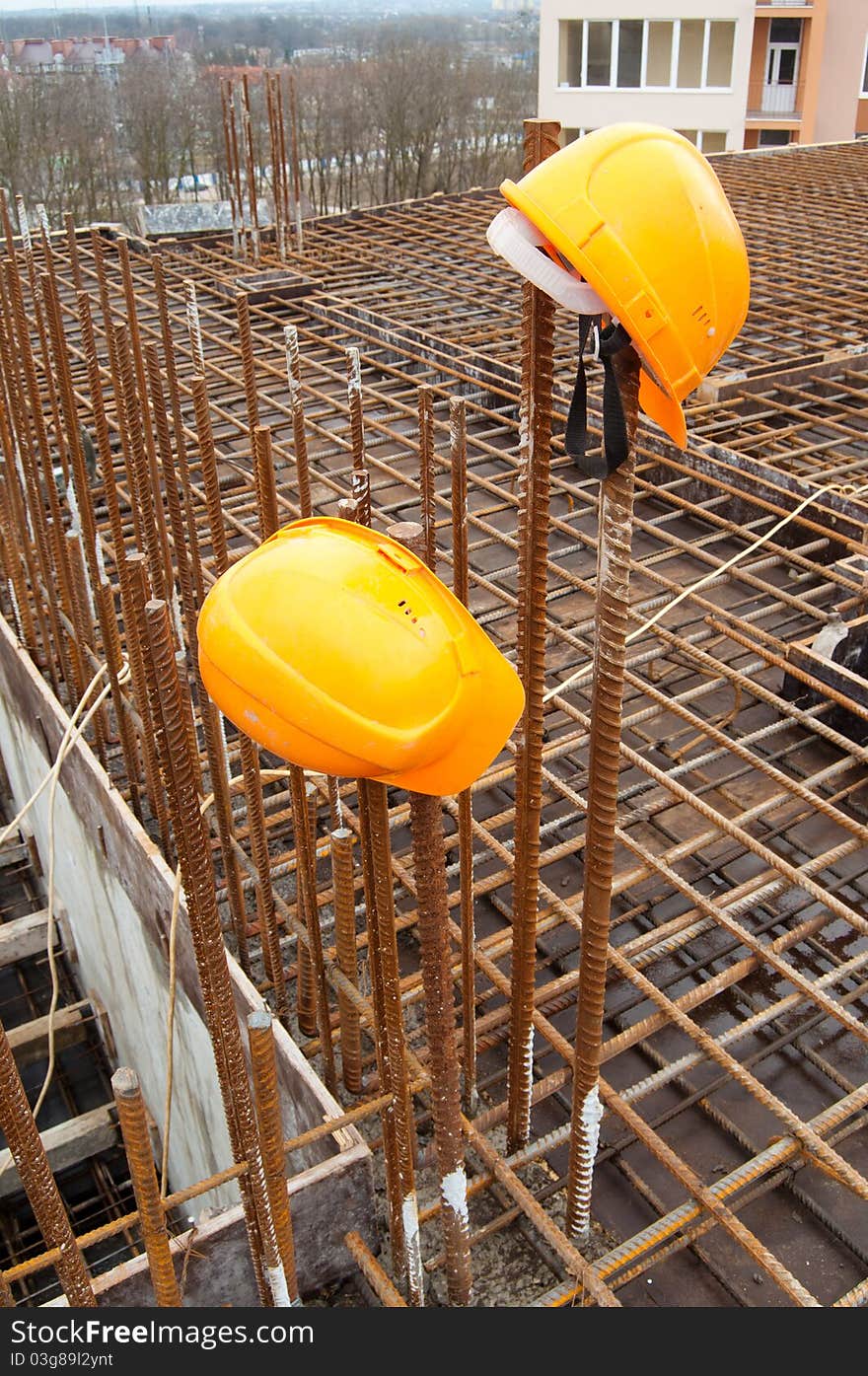 Two construction helmets and reinforcement