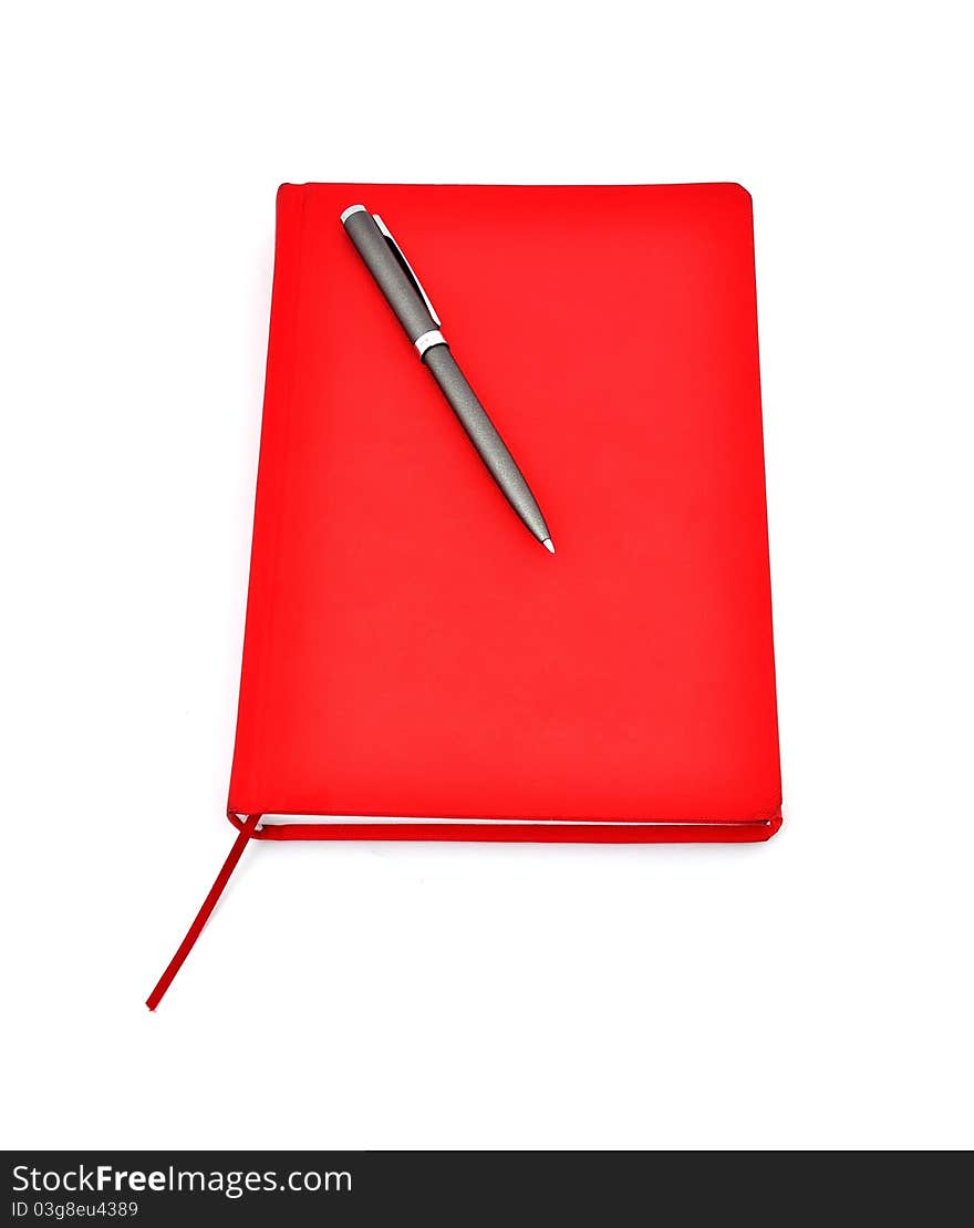 Red diary and pen