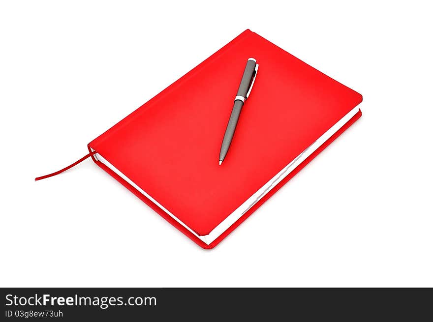 Red diary and pen