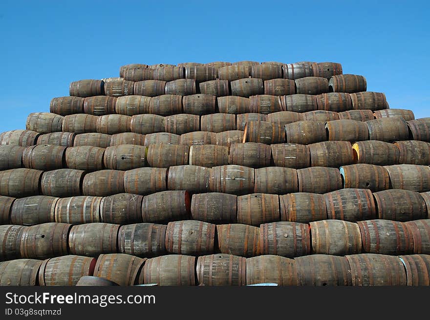 Stacked whisky barrels in a cooperage in scotland