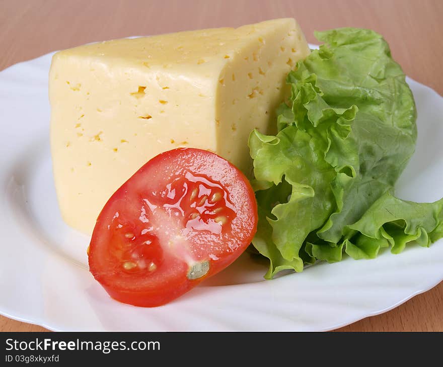 Vegetables And Cheese On Plate