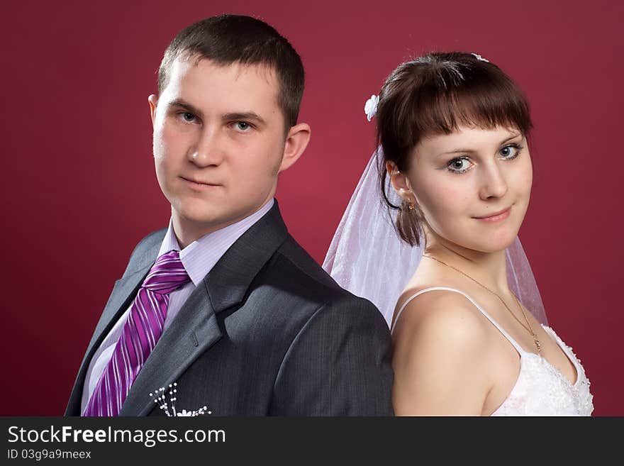 Couple Newlyweds In Wedding Dress And Suit